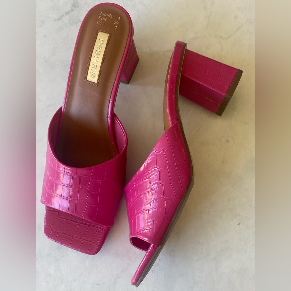 Pink crocodile print heels